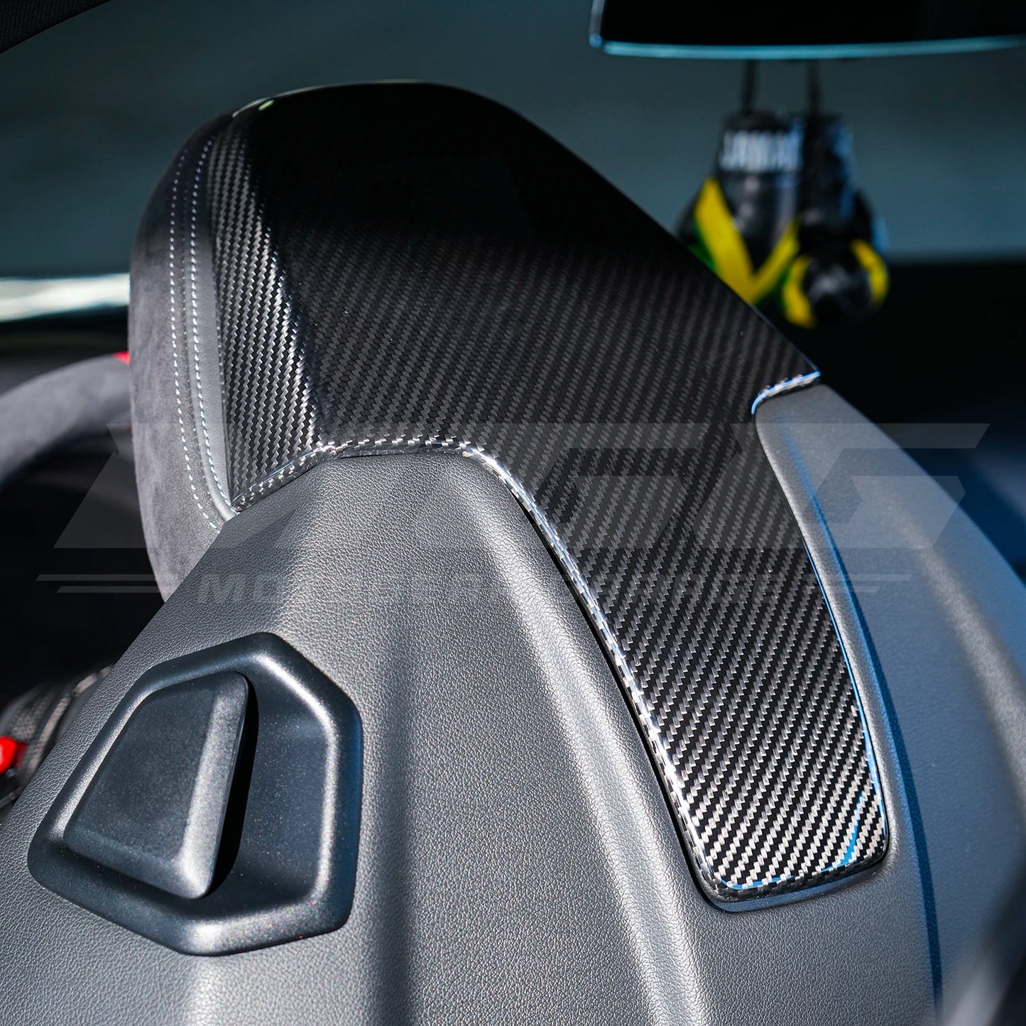 Installed Dry Carbon Fiber seat back covers for BMW G80 M3 & G82 M4 comfort seats.