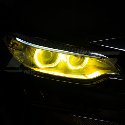 BMW F87 M2 with CSL style yellow DRL LED modules ON.