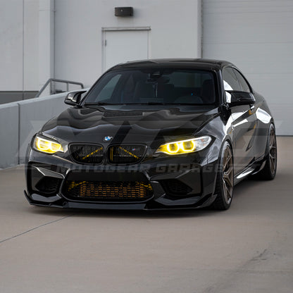 BMW F87 M2 with CSL style yellow DRL LED modules ON.
